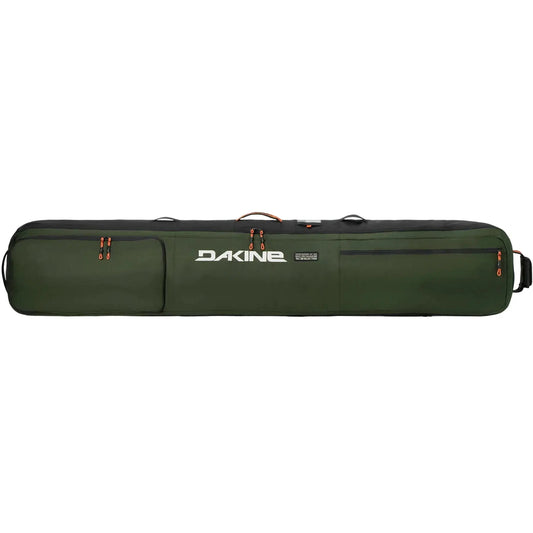 A dark green Dakine ski boot bag with black zippers, orange accent pulls, and a white logo on the front, shown against a plain white background.